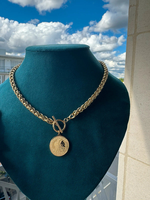 Magnifique collier et ses boucles en acier inoxydable
